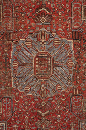Antique Shiraz Rug with a Bold Medallion