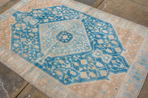 Antique Persian Malayer with Large Sky Blue Medallion and Camel-Tone Corners