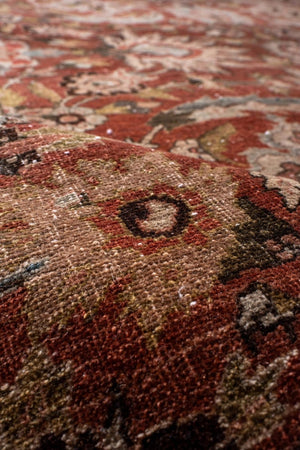 Antique Persian Tabriz with Floral Medallion Design in Rich Earth Tones